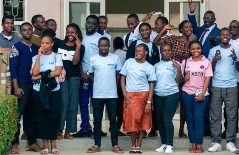 Close group photo of participants in IEEE Students shirts.